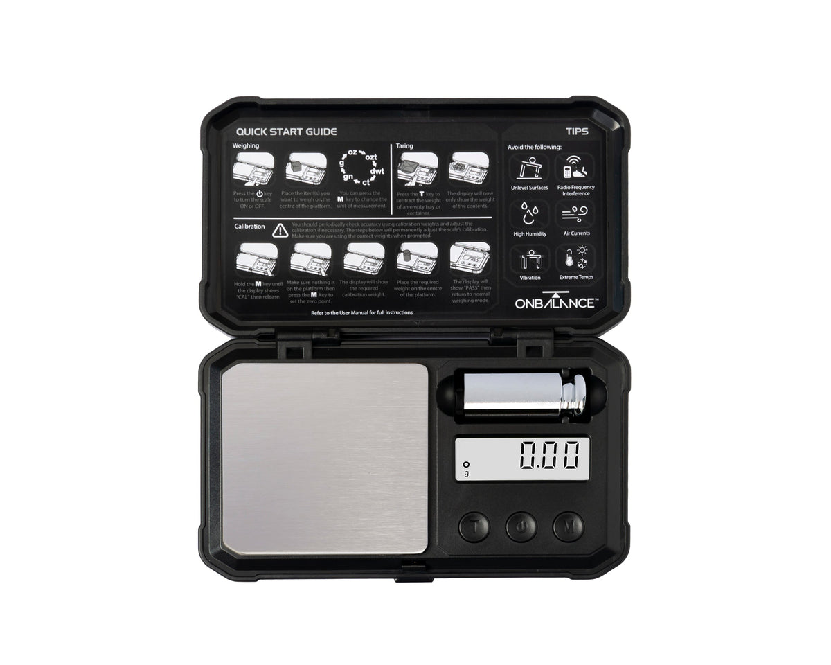 On Balance Predator PR-100 black pocket scale, open with calibration weight