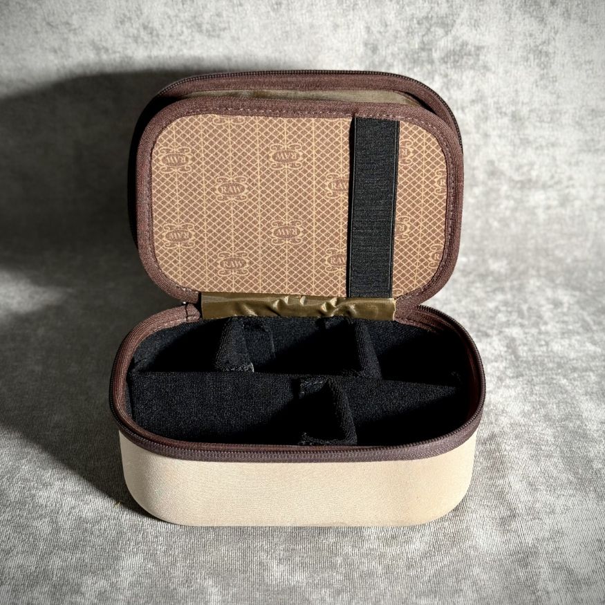 RAW x Puff Life Pro cream case — open interior dividers